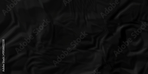 Crumple crushed black paper obsolete rumple craft design. wrinkle ripped creased crumple aged closeup recycled document grunge paper background.