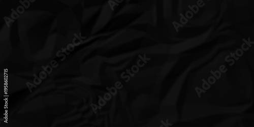 Crumple crushed black paper obsolete rumple craft design. wrinkle ripped creased crumple aged closeup recycled document grunge paper background.