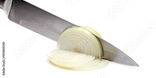 Sharp kitchen knife precisely slicing a fresh white onion
