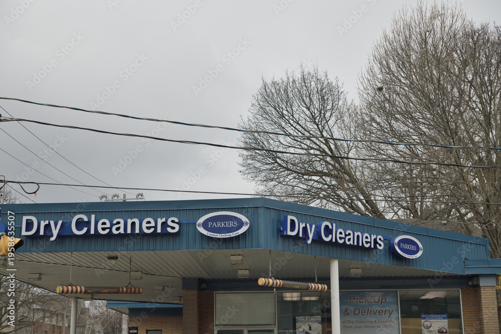 Fototapeta premium exterior building and sign of Parkers Custom Clothing Care and Dry Cleaners located here at 1696 Bayview Av, Toronto