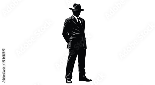 A sharply dressed man in a suit and hat a striking silhouette