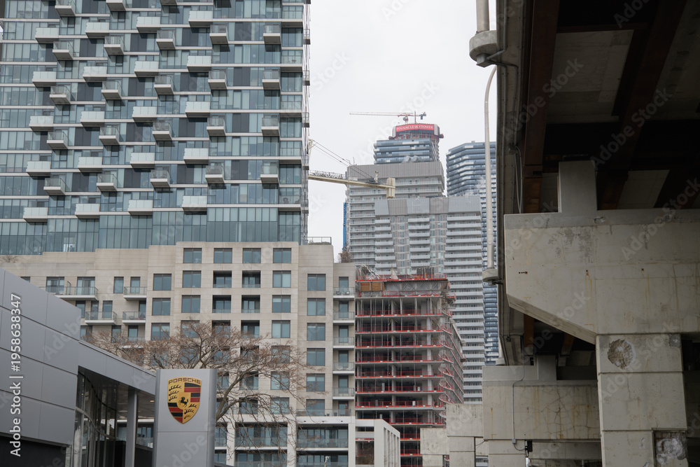 Fototapeta premium looking west from Porsche Centre Downtown Toronto (Monde Condominiums, elevated Gardiner Expressway, and residential towers), 259 Lake Shore Blvd E