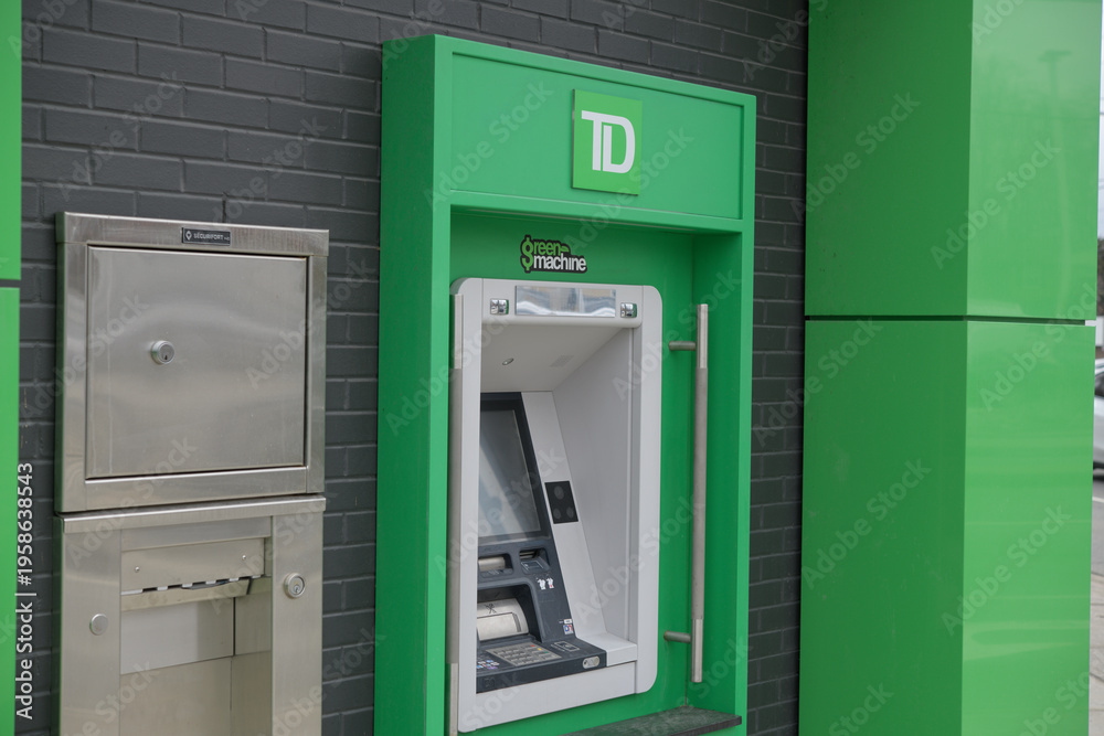 Fototapeta premium exterior of a TD green machine outside bank branch at 1213 Bayview Av, East York, Toronto