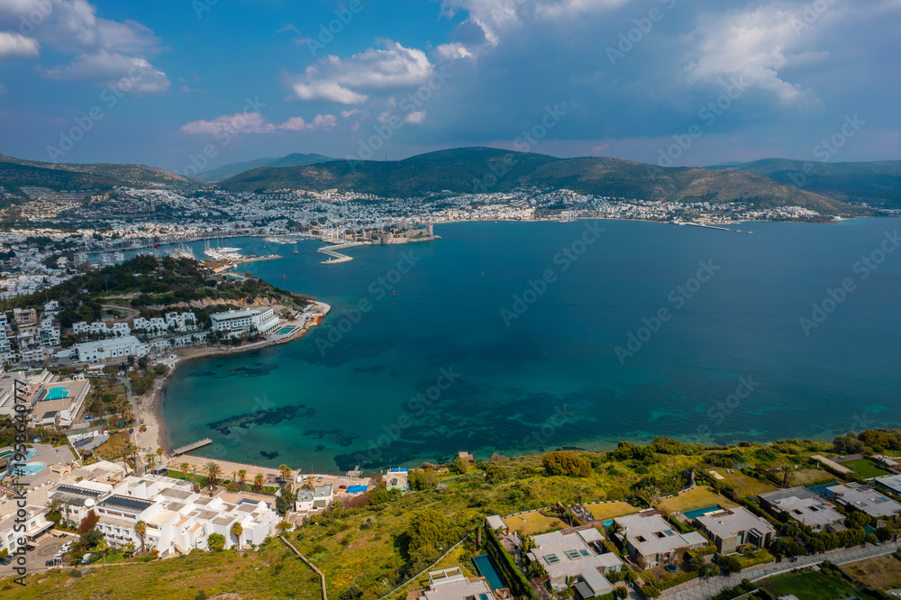 Obraz premium Bodrum, Turkey. Drone view of Bodrum bay from a hilltop under the bright spring sun. Aerial View, Camera Departure