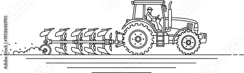 Tractor with a plow attachment in a field