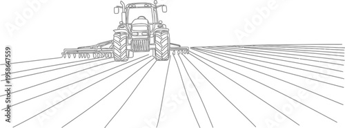 Tractor plowing a field in a rural landscape