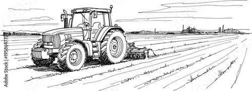 Tractor plowing a field in rural landscape