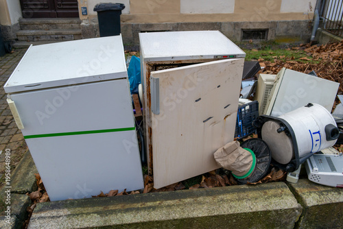 Electronic waste and bulky waste on the street