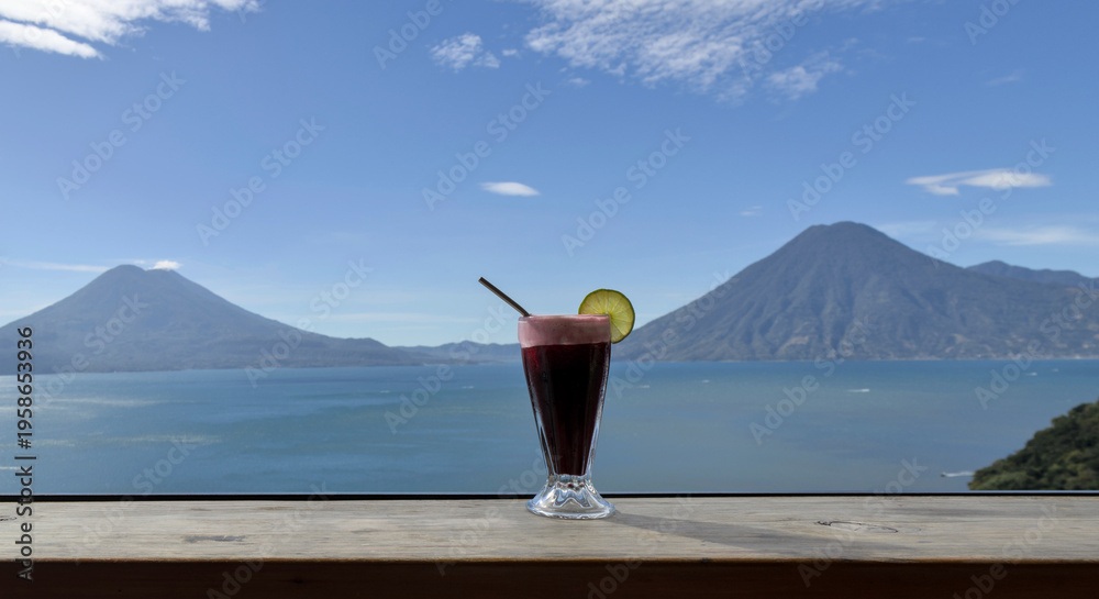 custom made wallpaper toronto digitalBeverage with lime garnish set against a scenic lake atitlan and volcano backdrop, relaxation and travel lifestyle smoothie