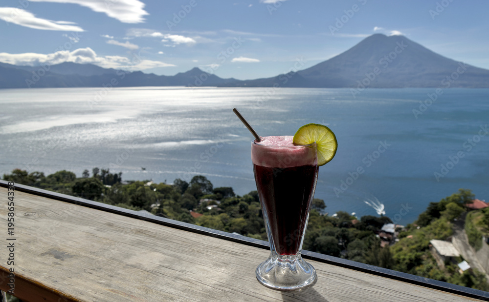 custom made wallpaper toronto digitalBeverage with lime garnish set against a scenic lake atitlan and volcano backdrop, relaxation and travel lifestyle smoothie