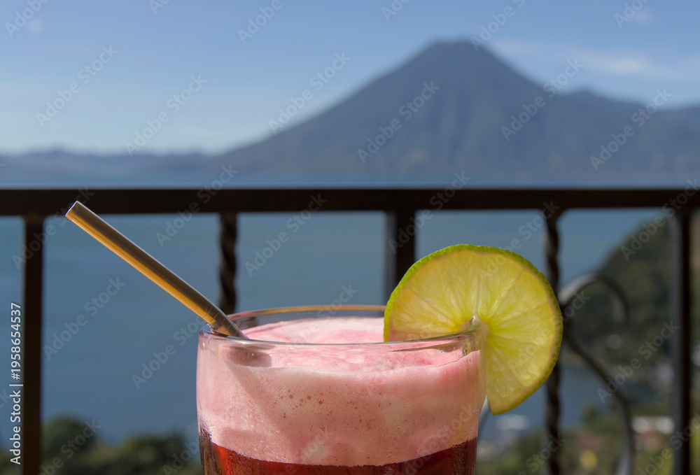 custom made wallpaper toronto digitalBeverage with lime garnish set against a scenic lake atitlan and volcano backdrop, relaxation and travel lifestyle smoothie