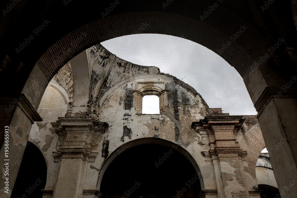 custom made wallpaper toronto digitalAncient stone ruins with arches and circular openings in Antigua Guatemala (architectural decay historical preservation)