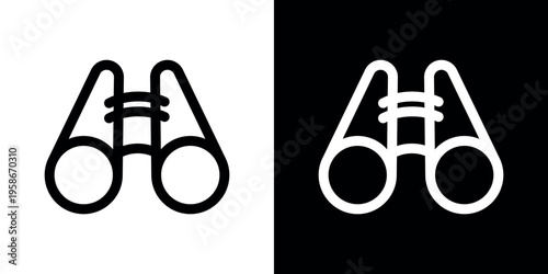 Black and white binoculars on split background symbol