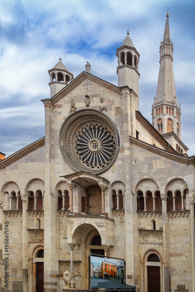 Fototapeta premium Faсade of Modena Cathedral in historic center of Modena, Italy. Romanesque architecture and sunny sky style