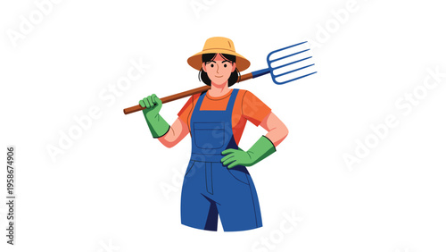 Friendly young woman farmer wearing denim overalls and a sun hat holds a large pitchfork over her shoulder on a white background.
