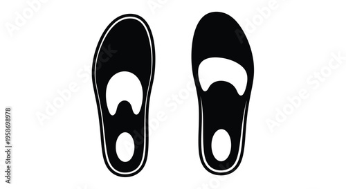 A pair of black and white swim fins seen from above