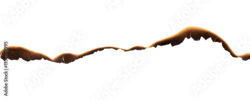 фотографія Burnt paper edge with dark scorch marks and curved burned shape