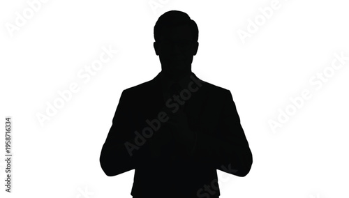 Dark silhouette of a confident professional male figure with folded arms against a bright background.