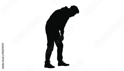 Silhouette of a tired young man bending over with hands resting on his knees isolated on white.