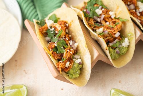 Easy slow cooker chicken tinga tacos. Spicy Mexican food 