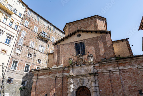 Tablou pe pânză Facade of the Church of the Compagnia della Morte (Company of Good Death), built 1575-1603 by Vincenzo Danti and Bino Sozi, with a rich mannerist travertine portal (1606), Umbria, Italy