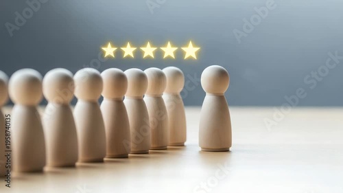 A hand places a glowing star on one of several wooden figures standing in a row technology motion animated video 4K