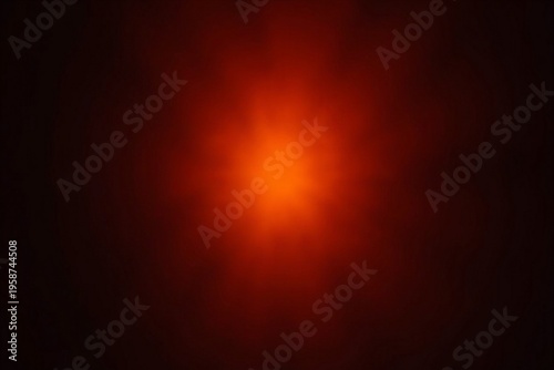 Abstract orange and red light leak on black background