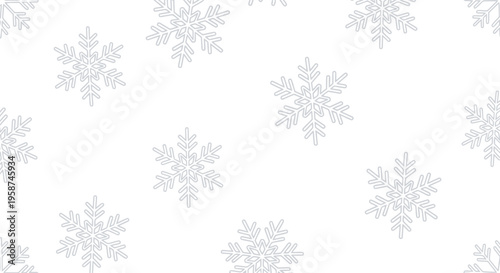 Snowflakes on white winter background.
