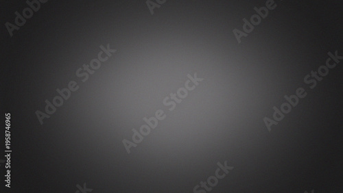 Fotografi Subtle dark gray background texture features a gentle vignette with light center