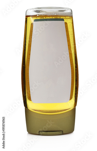 bottle of honey or agava syrup with blank white label isolated on white background