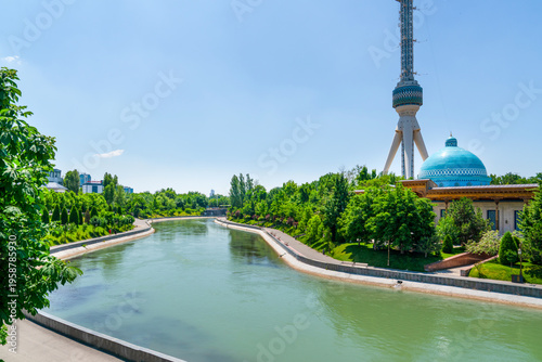 Scenic view of the Anhor Canal flowing past the Museum of Victims of Political Repression and the Tashkent Television Tower, Tashkent (Toshkent), Uzbekistan