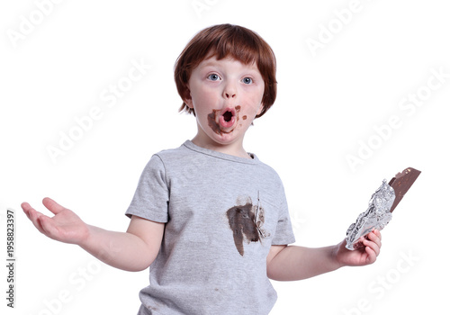 Worried little boy stained t-shirt with chocolate on white background