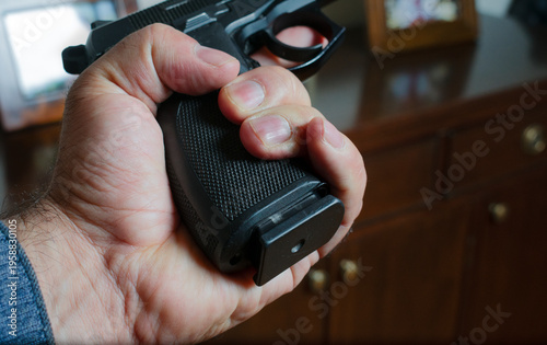 Experienced Marksman Preparing for Practical Shooting