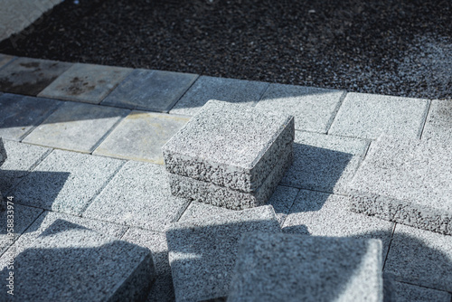 Permeable pavers in square form ready for installation on the ground