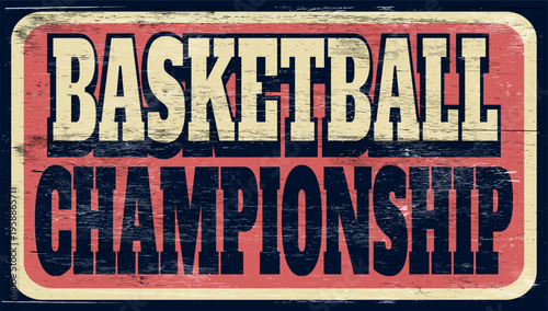 Aged and worn basketball championship sign on wood