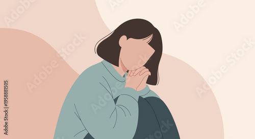 Young woman in a blue sweater sitting and contemplating with a thoughtful expression.