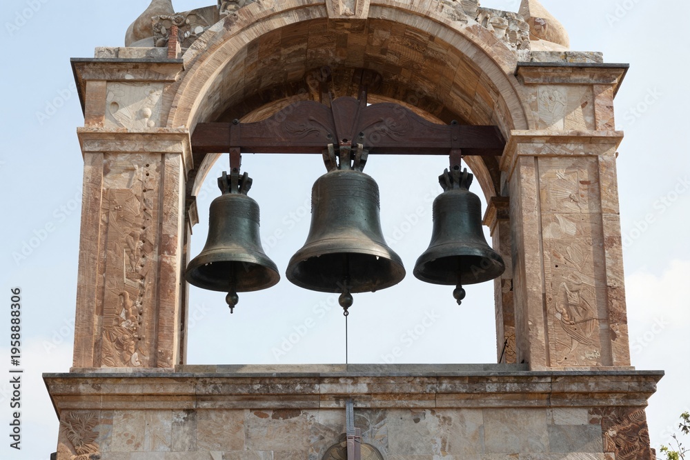 Fototapeta premium Historic Bell Tower – Three Bells in Arched Structure
