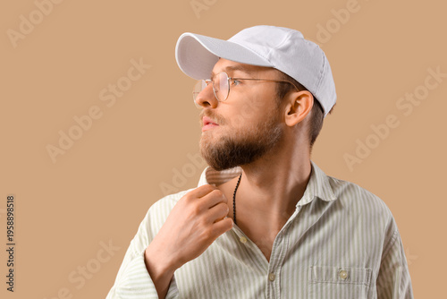 Stylish young man in eyegla...