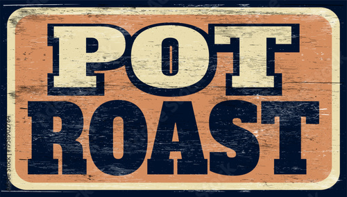 Aged and worn pot roast sign on wood