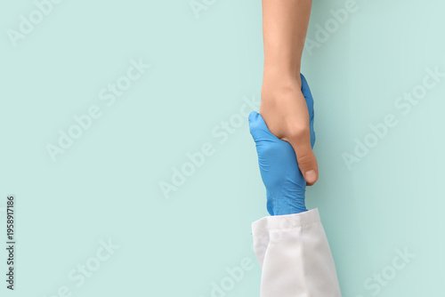 Female doctor with patient ...