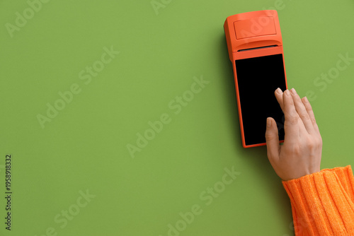 Female hand with payment te...