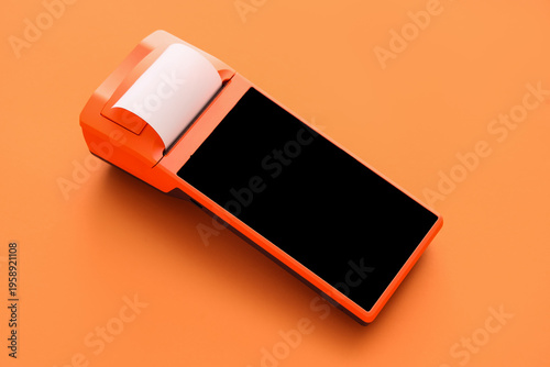Payment terminal on orange ...