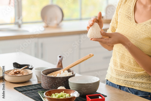Young woman preparing tradi...