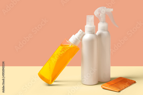 Hair sprays with comb on co...