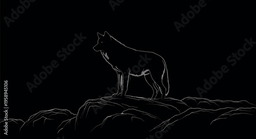Wolf standing on rocky mountain peak.