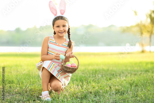 Cute little girl with bunny...