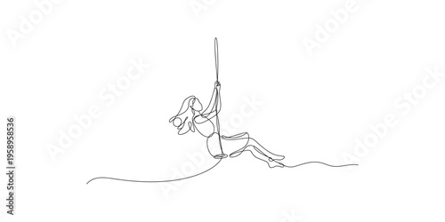 Woman in motion swinging on a trapeze with one leg extended swing acrobatic artistic line