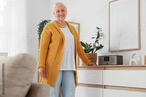 Senior woman with radio rec...