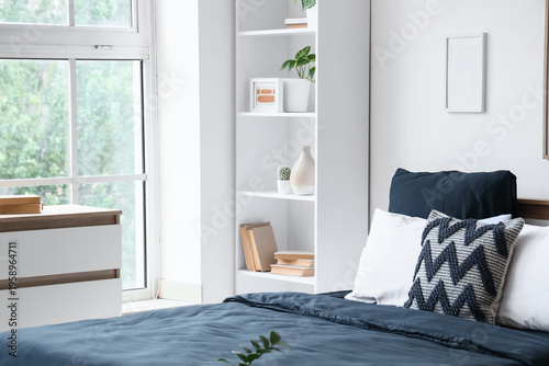 Interior of bedroom with sh...