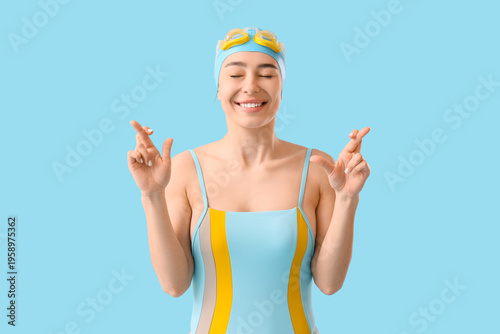Young happy female swimmer ...